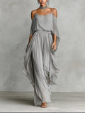 Conjunto gris de top y pantalón de Noura Madrid