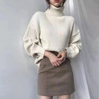 Neus | Pullover de lujo con cuello alto y mangas abullonadas