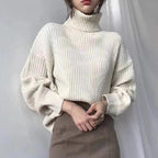 Neus | Pullover de lujo con cuello alto y mangas abullonadas