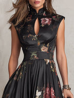 Vestido midi de satén negro plisado de Noura Madrid
