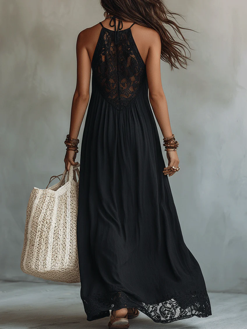 Vestido largo negro con encaje de Noura Madrid