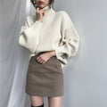 Neus | Pullover de lujo con cuello alto y mangas abullonadas